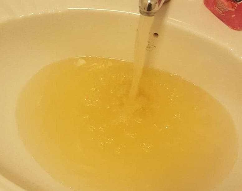 yellow water in the sink